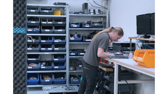 Technician working on a task in techinc room 2