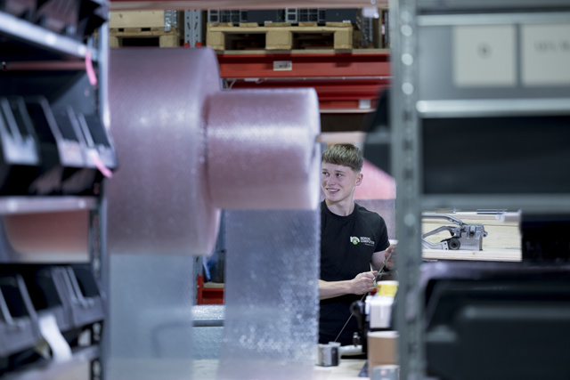 Nordic Computer employee working in the storage