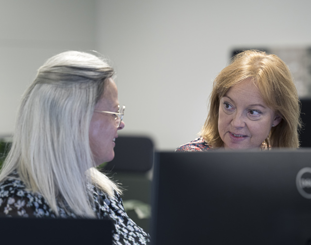 Two people working together on a project